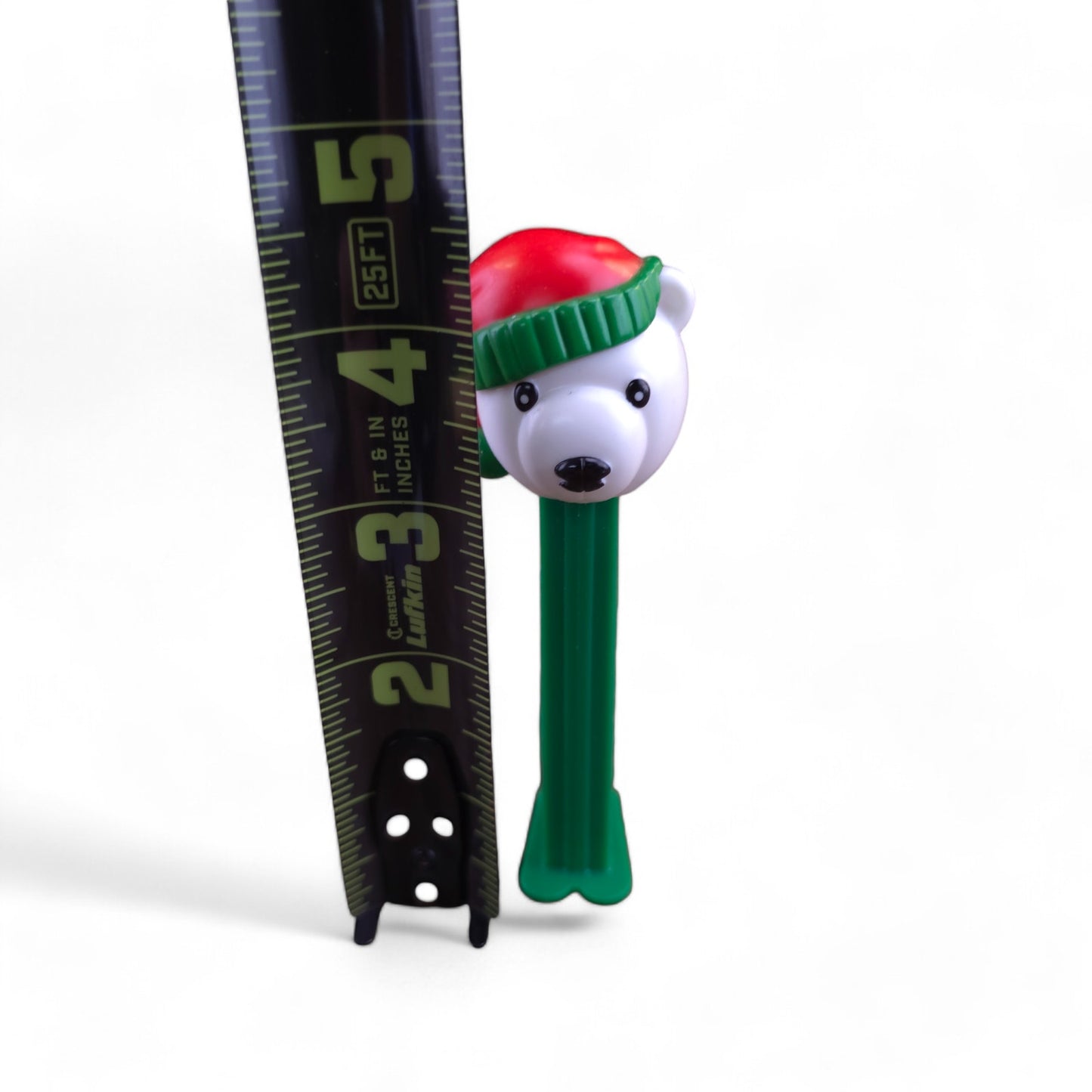 PEZ Christmas Polar Bear with Santa Hat Footed Candy Dispenser 2009 Green