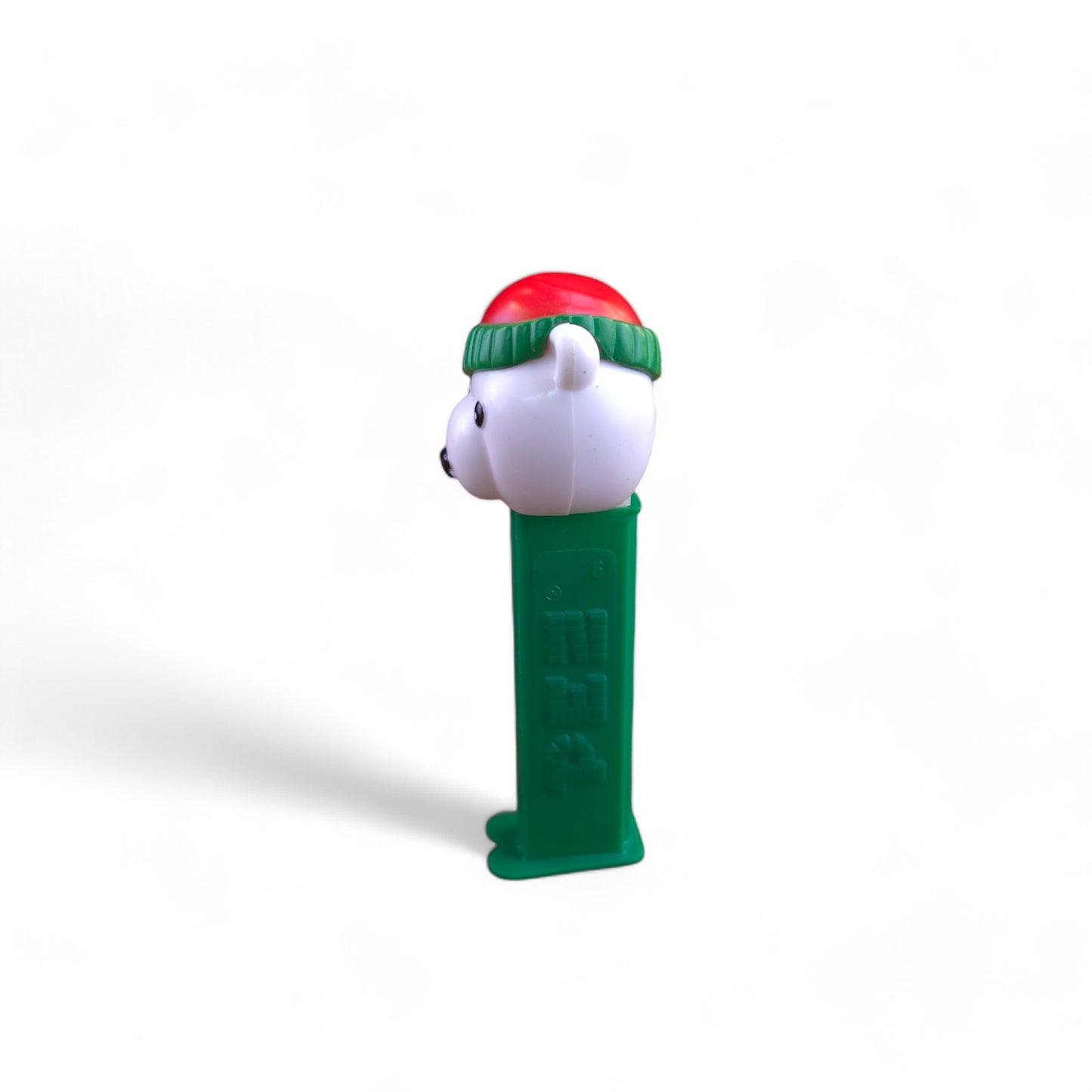 PEZ Christmas Polar Bear with Santa Hat Footed Candy Dispenser 2009 Green